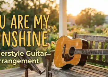 Acoustic guitar resting on a weathered bench on a porch at sunset, with bold yellow text: 'YOU ARE MY SUNSHINE' and smaller subtitle 'Fingerstyle Guitar Arrangement'